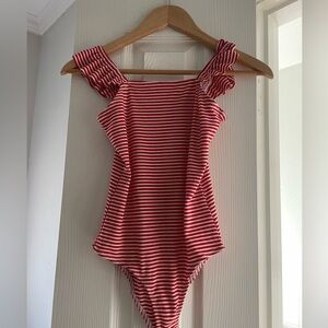 Red and white striped body suit